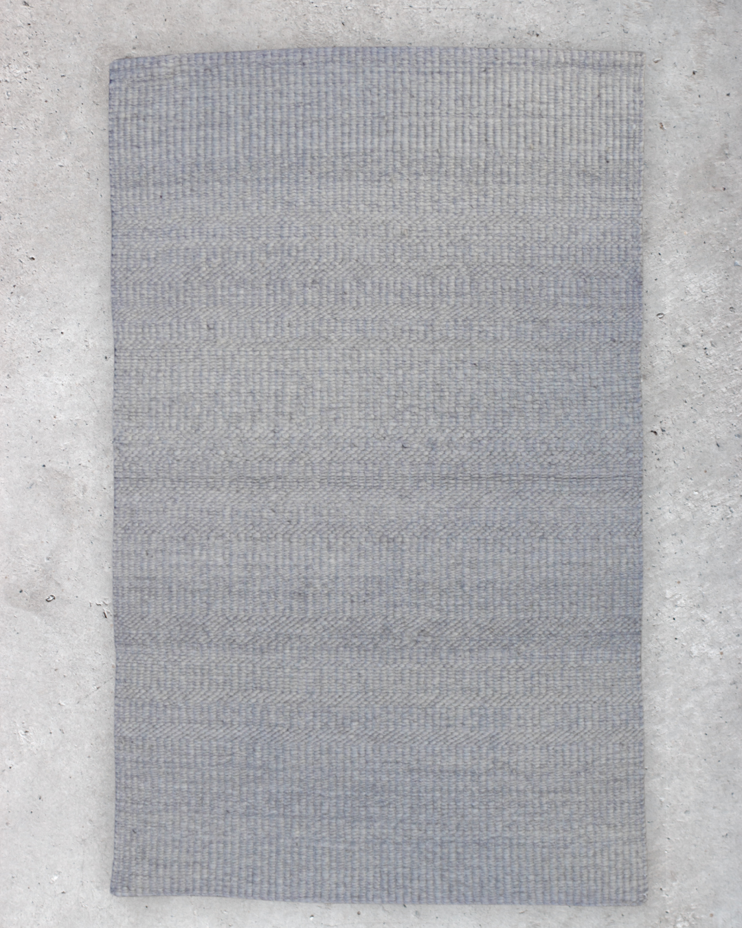 Makalani Karakoelwol Tapyt — Grys (95 x 151cm)